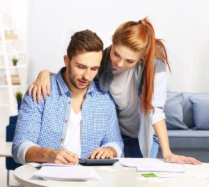 Couple of homeowners finding ways online on how to save money during this uncertain time