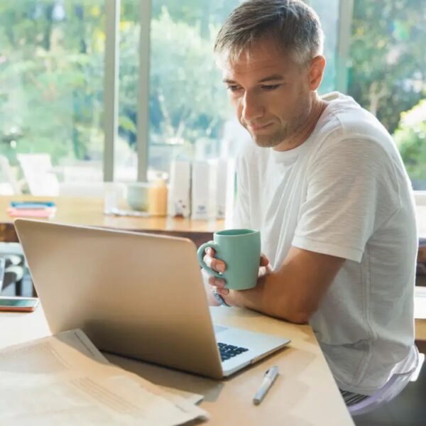 Homeowner checking his credit score before applying for a home equity loan