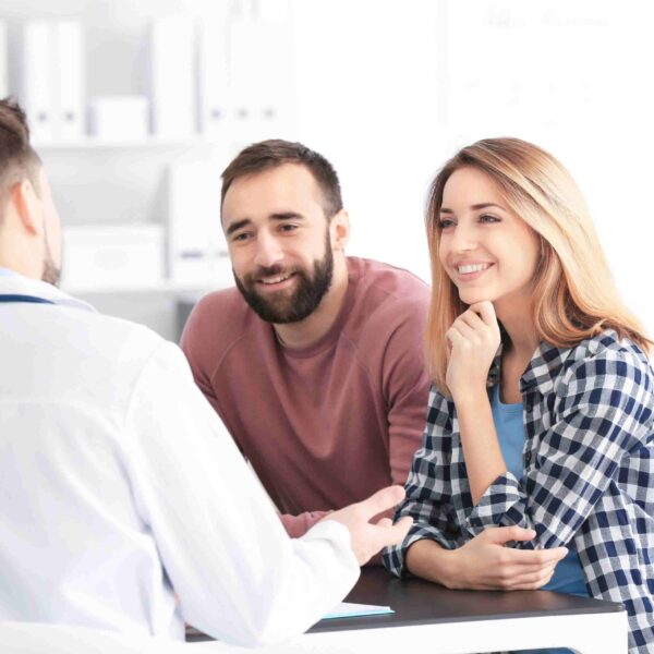 homeowner couple talking advisor about the best to cash out before your their credit score drops